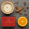 Candle in a tin with cinnamon, orange, and clove scent, eco-friendly