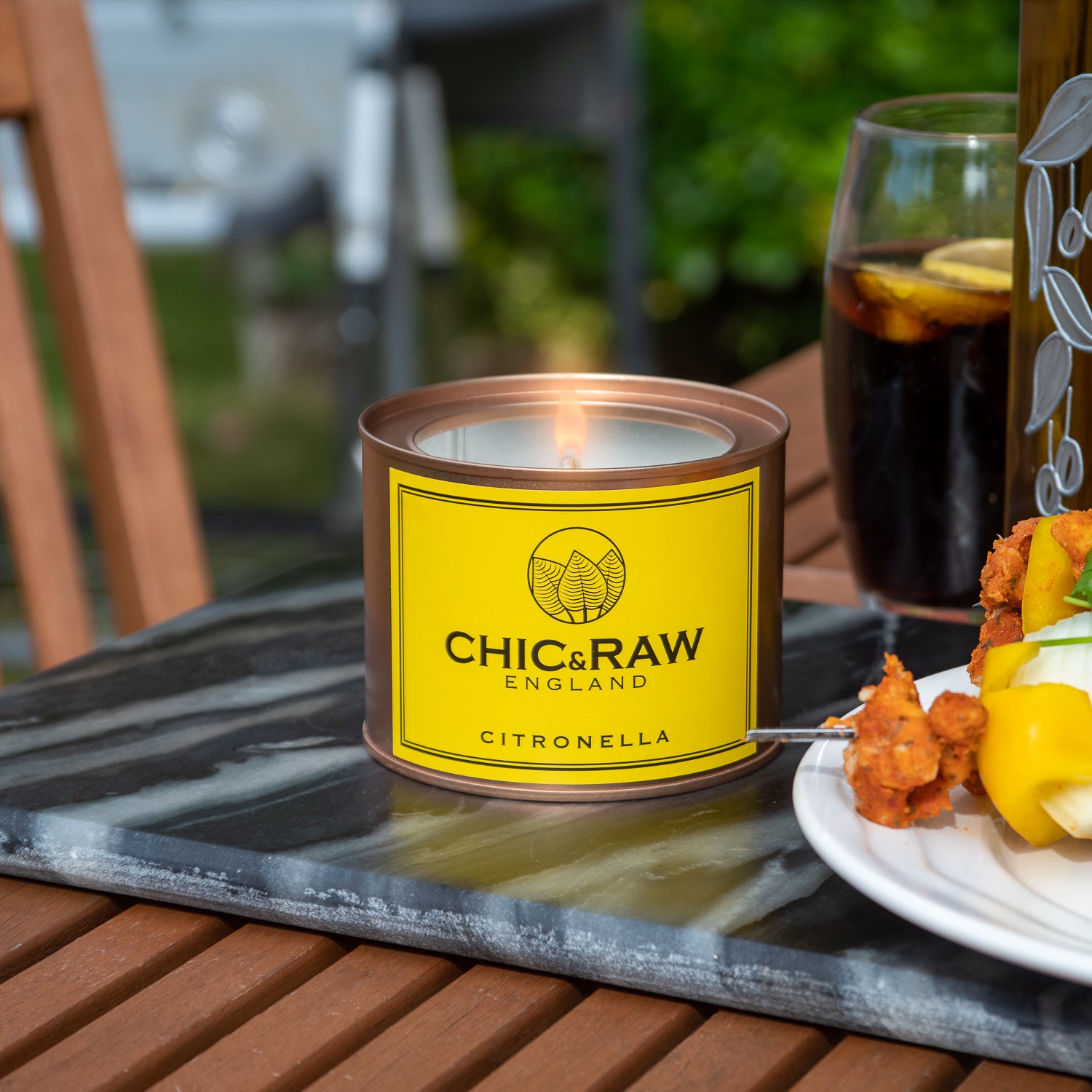 Lit citronella candle, long-lasting, eco-friendly candle